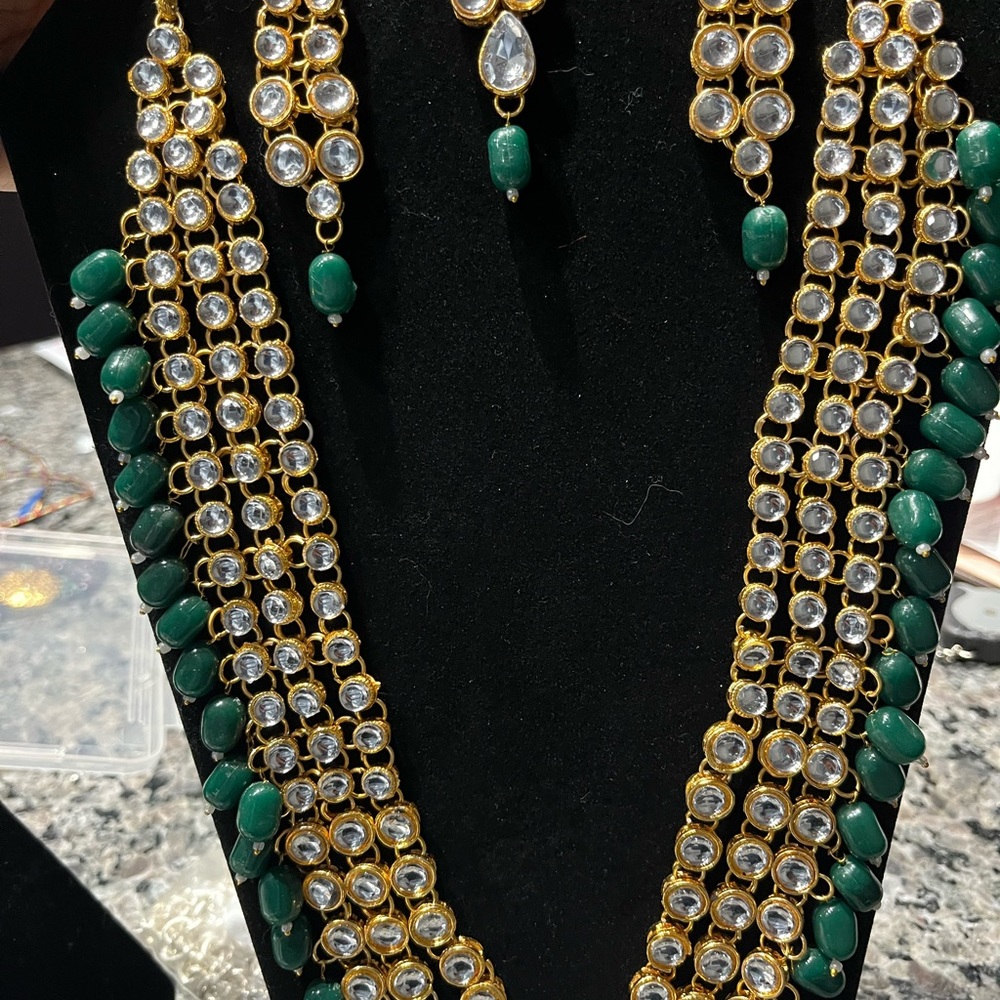 Long green stones and polki necklace